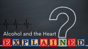 The words Alcohol & the Heart Explained on a black background with a question mark. The word explained depicted as block toys